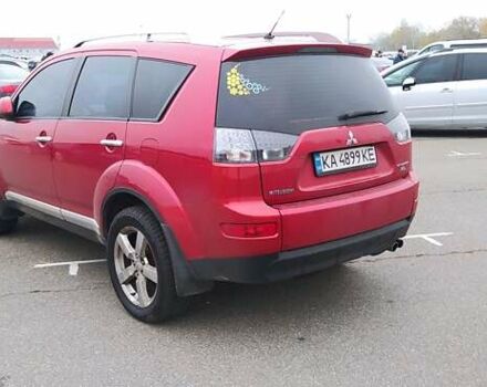 Красный Мицубиси Аутлендер, объемом двигателя 3 л и пробегом 260 тыс. км за 9000 $, фото 4 на Automoto.ua
