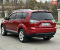 Красный Мицубиси Аутлендер, объемом двигателя 2.4 л и пробегом 180 тыс. км за 8900 $, фото 12 на Automoto.ua