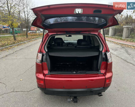 Красный Мицубиси Аутлендер, объемом двигателя 2.4 л и пробегом 180 тыс. км за 8900 $, фото 45 на Automoto.ua