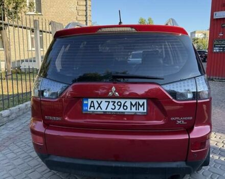 Красный Мицубиси Аутлендер, объемом двигателя 2.36 л и пробегом 143 тыс. км за 8500 $, фото 4 на Automoto.ua