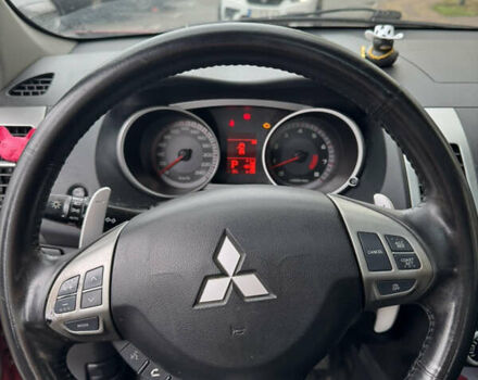 Красный Мицубиси Аутлендер, объемом двигателя 3 л и пробегом 204 тыс. км за 8200 $, фото 15 на Automoto.ua