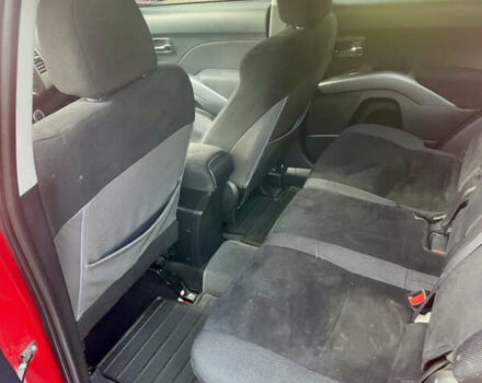 Красный Мицубиси Аутлендер, объемом двигателя 2.36 л и пробегом 306 тыс. км за 9300 $, фото 8 на Automoto.ua