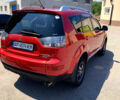 Красный Мицубиси Аутлендер, объемом двигателя 2.4 л и пробегом 246 тыс. км за 9500 $, фото 4 на Automoto.ua