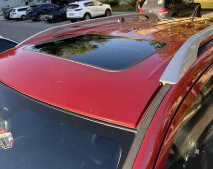 Красный Мицубиси Аутлендер, объемом двигателя 2.36 л и пробегом 143 тыс. км за 8500 $, фото 5 на Automoto.ua