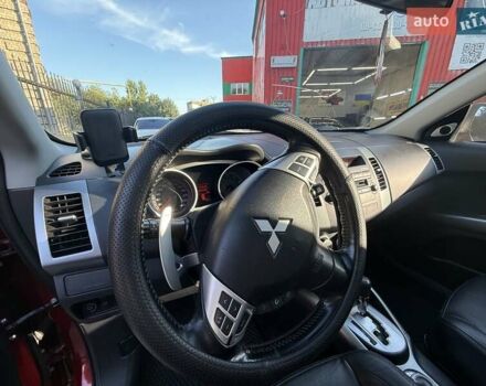 Красный Мицубиси Аутлендер, объемом двигателя 2.36 л и пробегом 143 тыс. км за 8500 $, фото 12 на Automoto.ua