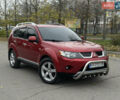 Красный Мицубиси Аутлендер, объемом двигателя 2.4 л и пробегом 180 тыс. км за 8900 $, фото 22 на Automoto.ua