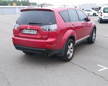 Красный Мицубиси Аутлендер, объемом двигателя 3 л и пробегом 260 тыс. км за 9000 $, фото 3 на Automoto.ua