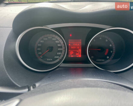 Красный Мицубиси Аутлендер, объемом двигателя 2.36 л и пробегом 306 тыс. км за 9300 $, фото 6 на Automoto.ua