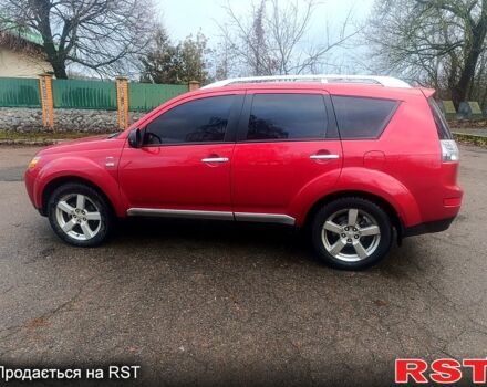Красный Мицубиси Аутлендер, объемом двигателя 3 л и пробегом 205 тыс. км за 9000 $, фото 6 на Automoto.ua