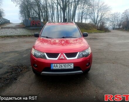 Красный Мицубиси Аутлендер, объемом двигателя 3 л и пробегом 205 тыс. км за 9000 $, фото 4 на Automoto.ua