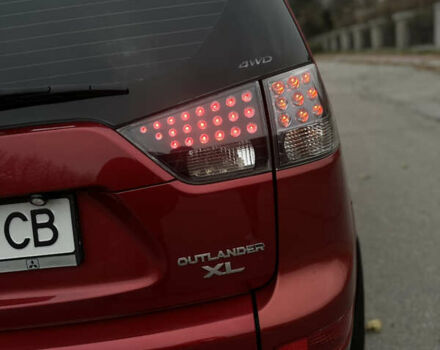 Красный Мицубиси Аутлендер, объемом двигателя 2.4 л и пробегом 180 тыс. км за 8900 $, фото 47 на Automoto.ua