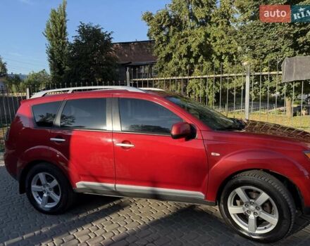 Красный Мицубиси Аутлендер, объемом двигателя 2.36 л и пробегом 143 тыс. км за 8500 $, фото 2 на Automoto.ua