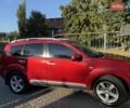 Красный Мицубиси Аутлендер, объемом двигателя 2.36 л и пробегом 143 тыс. км за 8500 $, фото 2 на Automoto.ua