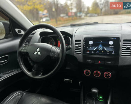 Красный Мицубиси Аутлендер, объемом двигателя 2.4 л и пробегом 180 тыс. км за 8900 $, фото 35 на Automoto.ua