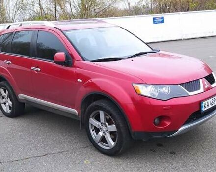 Красный Мицубиси Аутлендер, объемом двигателя 3 л и пробегом 260 тыс. км за 9000 $, фото 1 на Automoto.ua