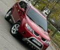 Красный Мицубиси Аутлендер, объемом двигателя 2.4 л и пробегом 180 тыс. км за 8900 $, фото 24 на Automoto.ua