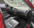 Міцубісі Аутлендер 2009 у Києві на Automoto.ua Червоний Міцубісі Аутлендер, об'ємом двигуна 2.36 л та пробігом 157 тис. км за 11499 $, фото 5 на Automoto.ua