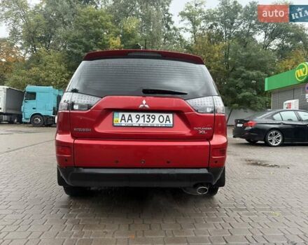 Міцубісі Аутлендер 2009 у Києві на Automoto.ua Червоний Міцубісі Аутлендер, об'ємом двигуна 2.36 л та пробігом 157 тис. км за 11499 $, фото 4 на Automoto.ua