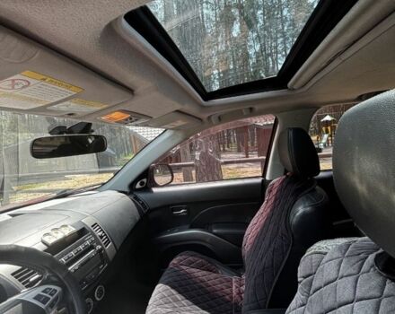 Червоний Міцубісі Аутлендер, об'ємом двигуна 3 л та пробігом 214 тис. км за 9200 $, фото 5 на Automoto.ua