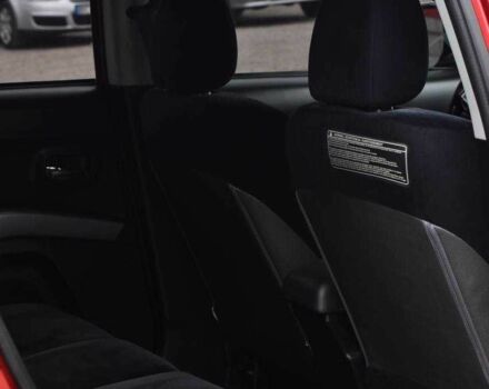 Красный Мицубиси Аутлендер, объемом двигателя 2.4 л и пробегом 204 тыс. км за 9499 $, фото 14 на Automoto.ua