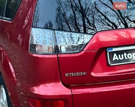 Красный Мицубиси Аутлендер, объемом двигателя 2.4 л и пробегом 251 тыс. км за 8990 $, фото 8 на Automoto.ua