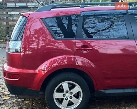 Красный Мицубиси Аутлендер, объемом двигателя 2.4 л и пробегом 251 тыс. км за 8990 $, фото 12 на Automoto.ua