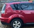 Красный Мицубиси Аутлендер, объемом двигателя 2.4 л и пробегом 251 тыс. км за 8990 $, фото 12 на Automoto.ua