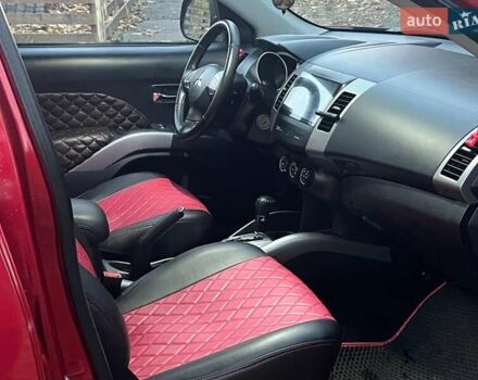 Красный Мицубиси Аутлендер, объемом двигателя 2.4 л и пробегом 251 тыс. км за 8990 $, фото 14 на Automoto.ua