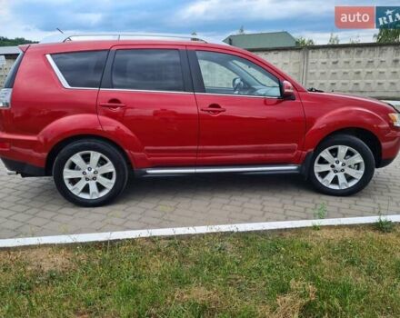 Червоний Міцубісі Аутлендер, об'ємом двигуна 2.2 л та пробігом 225 тис. км за 11000 $, фото 1 на Automoto.ua