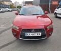 Красный Мицубиси Аутлендер, объемом двигателя 2.4 л и пробегом 220 тыс. км за 7200 $, фото 3 на Automoto.ua