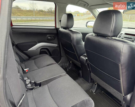 Красный Мицубиси Аутлендер, объемом двигателя 2 л и пробегом 204 тыс. км за 10350 $, фото 35 на Automoto.ua