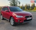 Красный Мицубиси Аутлендер, объемом двигателя 2.27 л и пробегом 250 тыс. км за 9600 $, фото 1 на Automoto.ua