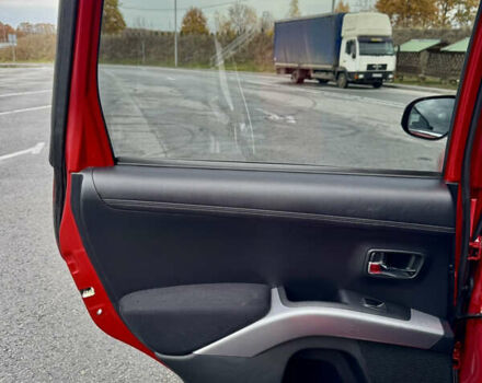 Красный Мицубиси Аутлендер, объемом двигателя 2 л и пробегом 204 тыс. км за 10350 $, фото 30 на Automoto.ua