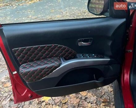 Красный Мицубиси Аутлендер, объемом двигателя 2.4 л и пробегом 251 тыс. км за 8990 $, фото 24 на Automoto.ua