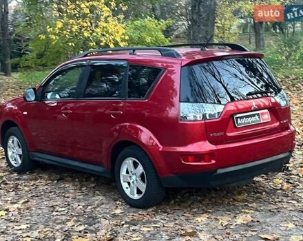 Красный Мицубиси Аутлендер, объемом двигателя 2.4 л и пробегом 251 тыс. км за 8990 $, фото 7 на Automoto.ua