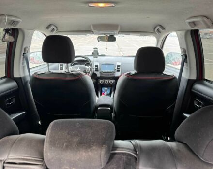 Красный Мицубиси Аутлендер, объемом двигателя 2.4 л и пробегом 201 тыс. км за 9750 $, фото 8 на Automoto.ua