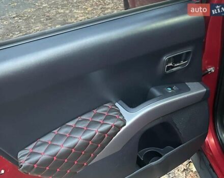 Красный Мицубиси Аутлендер, объемом двигателя 2.4 л и пробегом 251 тыс. км за 8990 $, фото 23 на Automoto.ua