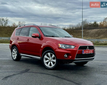 Красный Мицубиси Аутлендер, объемом двигателя 2 л и пробегом 204 тыс. км за 10350 $, фото 42 на Automoto.ua