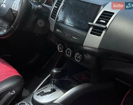 Красный Мицубиси Аутлендер, объемом двигателя 2.4 л и пробегом 251 тыс. км за 8990 $, фото 16 на Automoto.ua