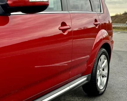 Красный Мицубиси Аутлендер, объемом двигателя 2 л и пробегом 204 тыс. км за 10350 $, фото 14 на Automoto.ua