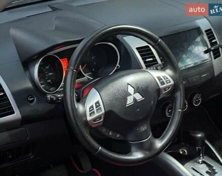 Красный Мицубиси Аутлендер, объемом двигателя 2.4 л и пробегом 251 тыс. км за 8990 $, фото 27 на Automoto.ua