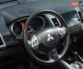 Красный Мицубиси Аутлендер, объемом двигателя 2.4 л и пробегом 251 тыс. км за 8990 $, фото 27 на Automoto.ua
