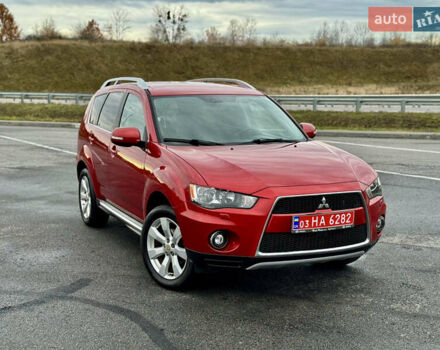 Красный Мицубиси Аутлендер, объемом двигателя 2 л и пробегом 204 тыс. км за 10350 $, фото 43 на Automoto.ua
