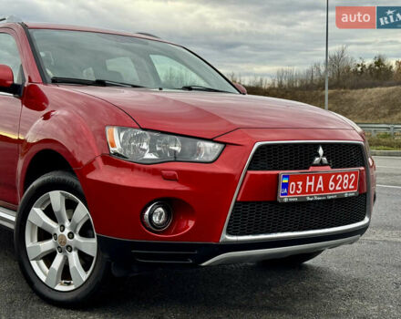 Красный Мицубиси Аутлендер, объемом двигателя 2 л и пробегом 204 тыс. км за 10350 $, фото 9 на Automoto.ua