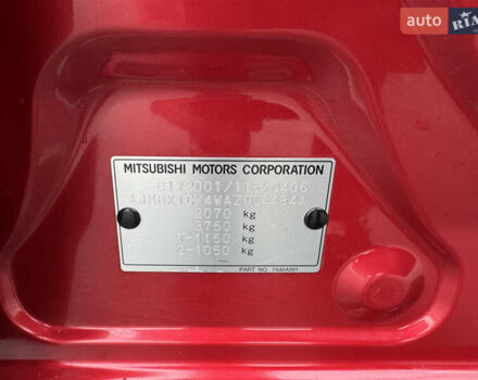 Красный Мицубиси Аутлендер, объемом двигателя 2 л и пробегом 204 тыс. км за 10350 $, фото 39 на Automoto.ua