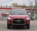 Красный Мицубиси Аутлендер, объемом двигателя 2.4 л и пробегом 204 тыс. км за 9499 $, фото 5 на Automoto.ua