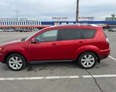 Красный Мицубиси Аутлендер, объемом двигателя 2.4 л и пробегом 201 тыс. км за 9750 $, фото 3 на Automoto.ua