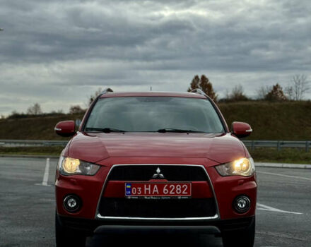 Красный Мицубиси Аутлендер, объемом двигателя 2 л и пробегом 204 тыс. км за 10350 $, фото 7 на Automoto.ua