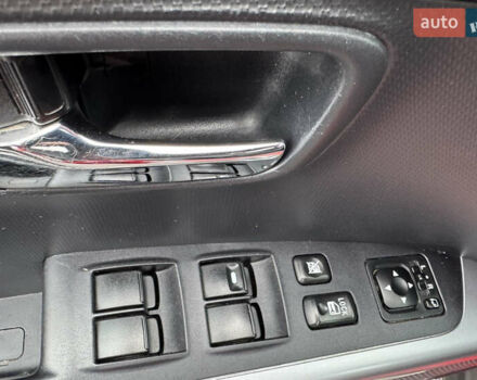 Красный Мицубиси Аутлендер, объемом двигателя 2 л и пробегом 204 тыс. км за 10350 $, фото 28 на Automoto.ua