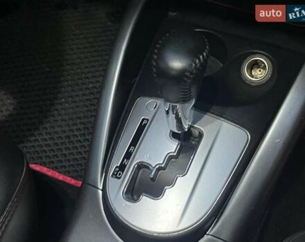 Красный Мицубиси Аутлендер, объемом двигателя 2.4 л и пробегом 251 тыс. км за 8990 $, фото 18 на Automoto.ua